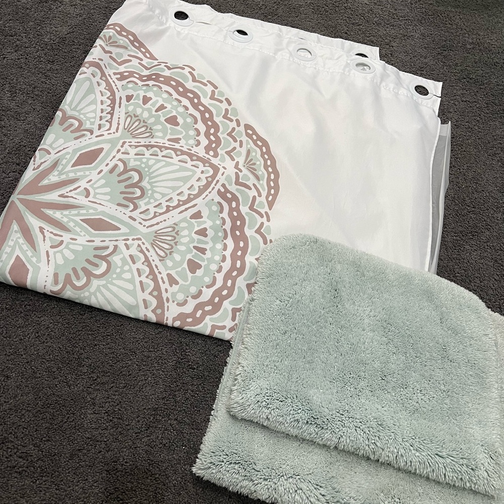 Shower curtain with built in rings